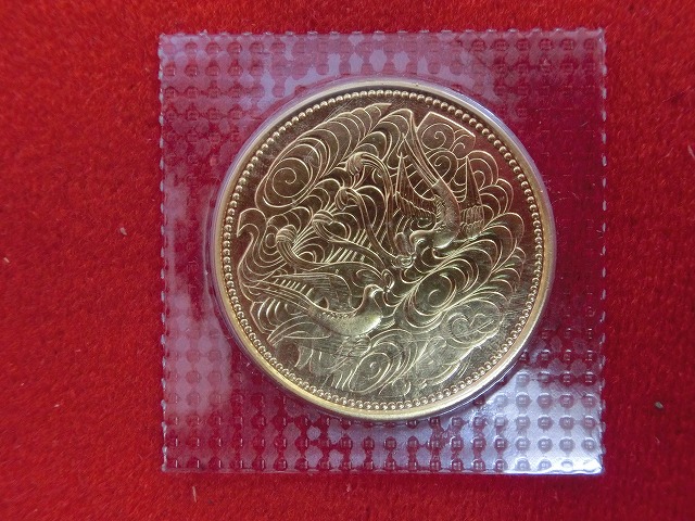 天皇陛下御在位60年記念　10万円金貨　62年銘